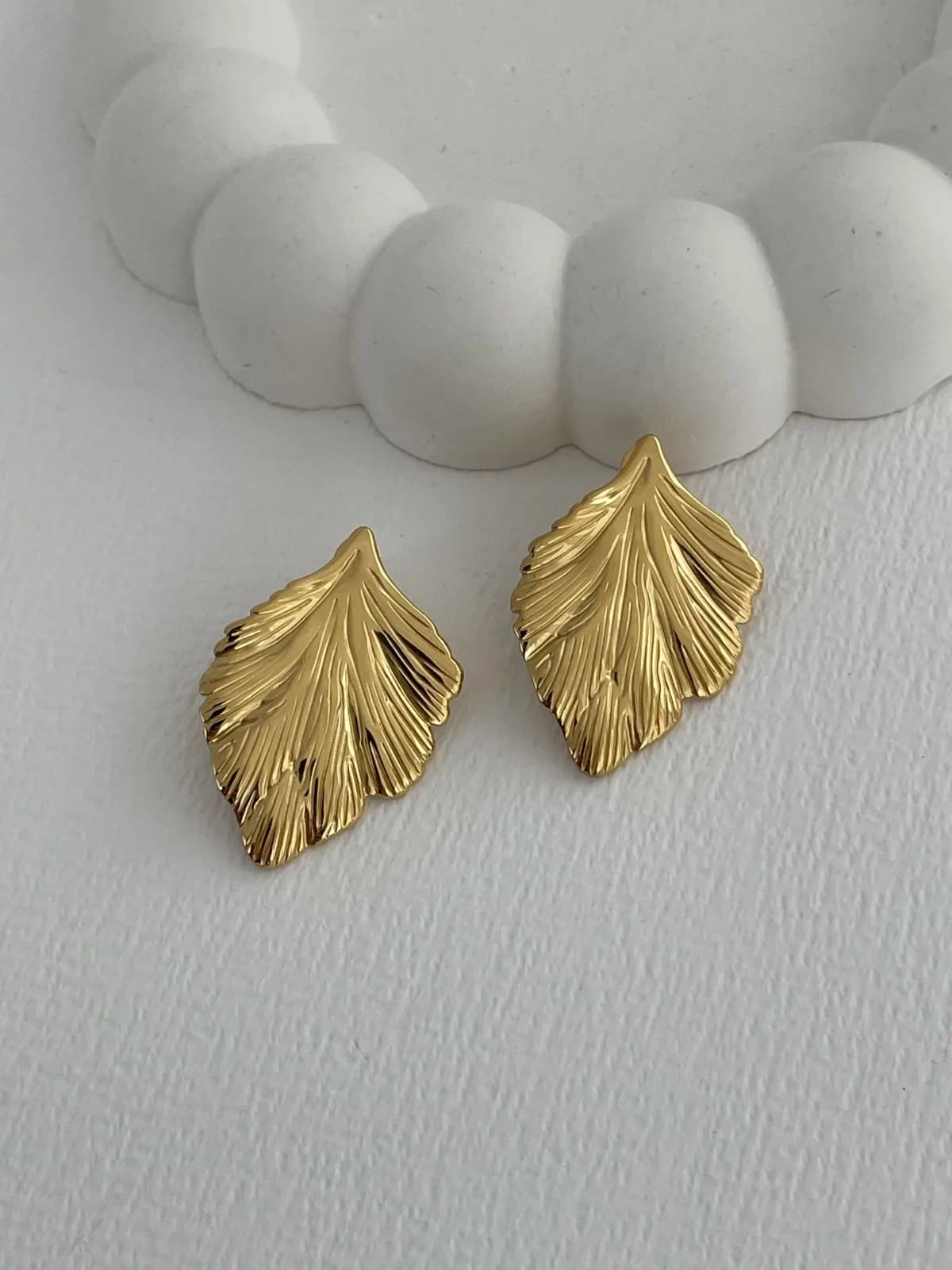 Çelik Yaprak Tasarım Gold Küpe